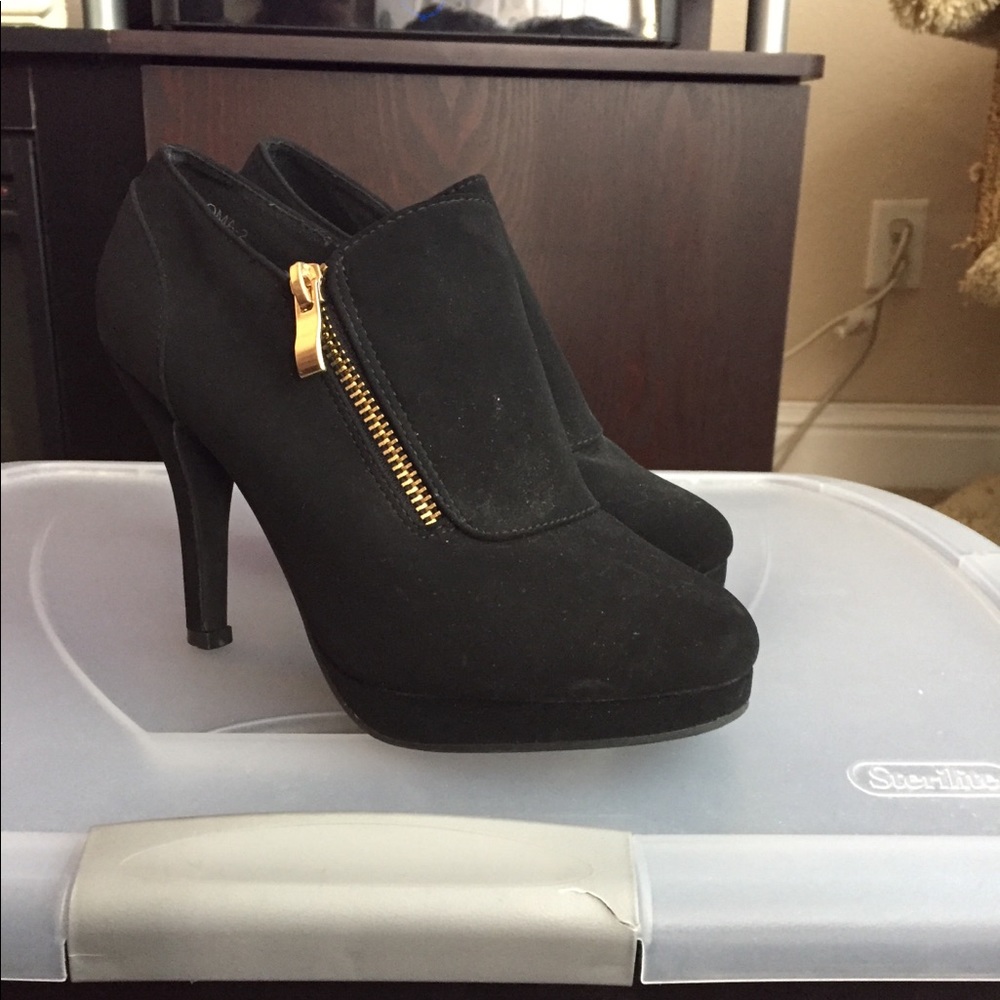 Black suede booties.